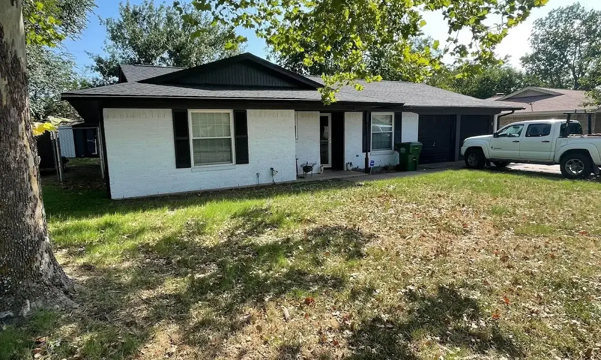 Professional roofing crew working on a residential roof in Susquehanna
